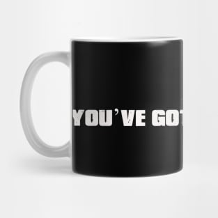 B - You've got red on you. Mug